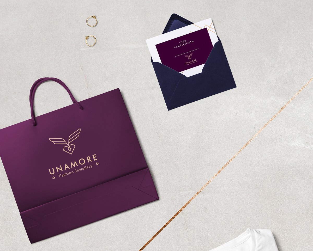 時尚珠寶首飾UNAMORE品牌設(shè)計和強化品牌“時尚”定位，時尚珠寶品牌設(shè)計，時尚品牌形象設(shè)計，品牌形象整合，珠寶品牌營銷，品牌戰(zhàn)略定位，品牌設(shè)計公司，品牌策劃公司，深圳品牌策劃，深圳品牌設(shè)計，左右格局